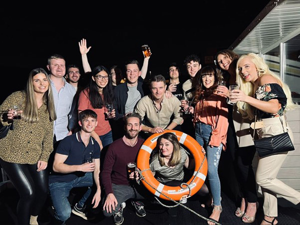 Alex with some of the Page Kirk team on their boat party.